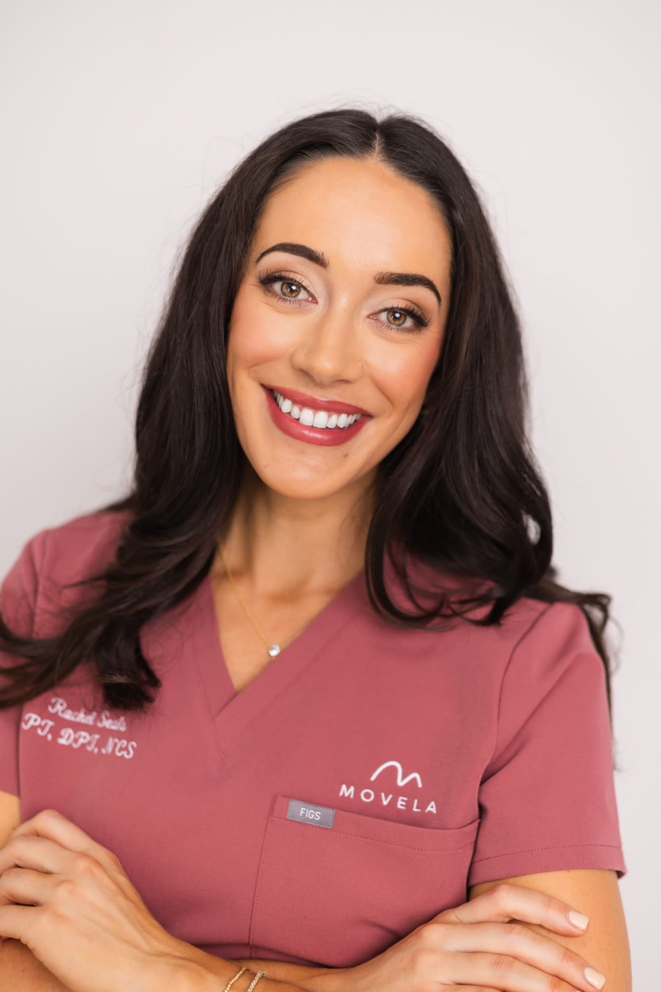 Dr. Rachel Seals — PT, DPT, NCS, founder of Movela, in Movela scrubs